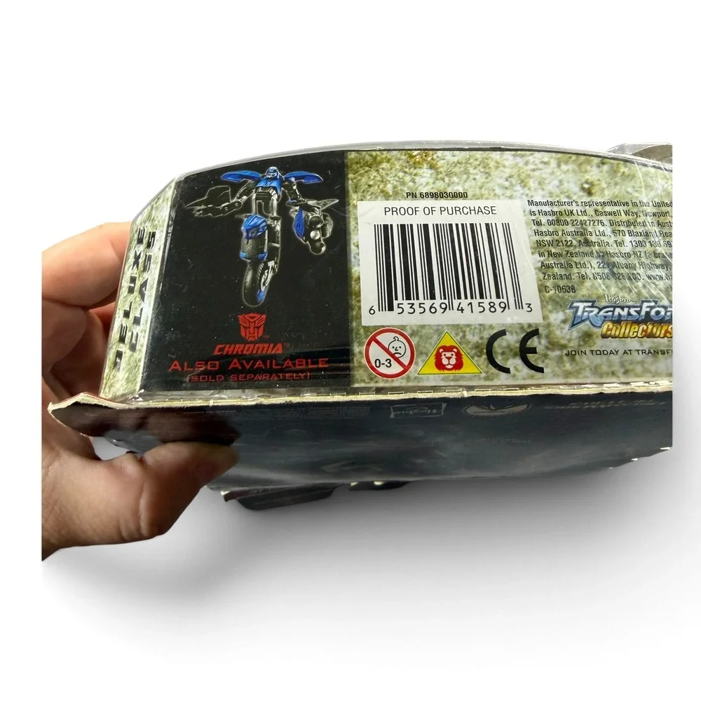 Transformers Revenge of the Fallen Autobot Wheelie Deluxe Class Figure 2009